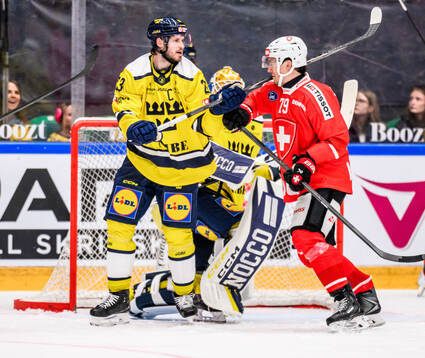 Oliver Ekman-Larsson of Sweden and Calvin Thurkauf of