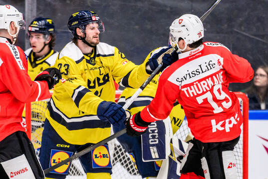 Oliver Ekman-Larsson of Sweden and Calvin Thurkauf of