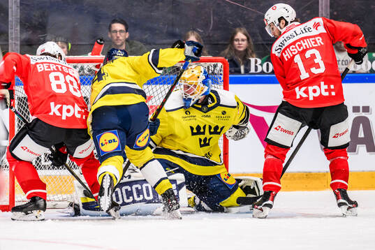 Christoph Bertschy of Switzerland and Jacob Larsson and