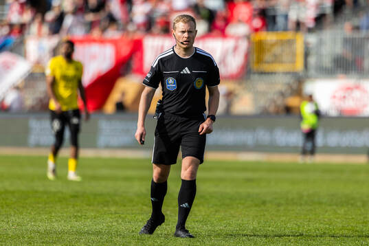 Domare Fredrik Klitte