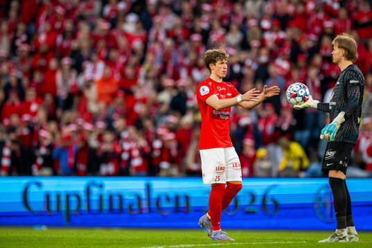 Niklas Jensen Wassberg and goalkeeper Simen Vidtun Nilsen