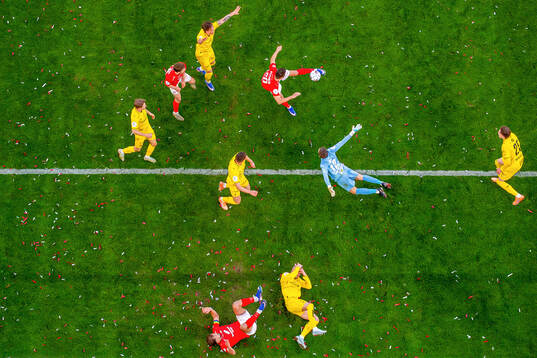 Vetle Dragsnes of Brann and goalkeeper Nikita Haikin of