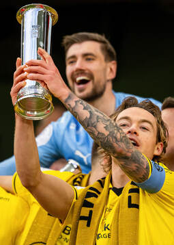 Patrick Berg and players of Bodø/Glimt celebrate with the