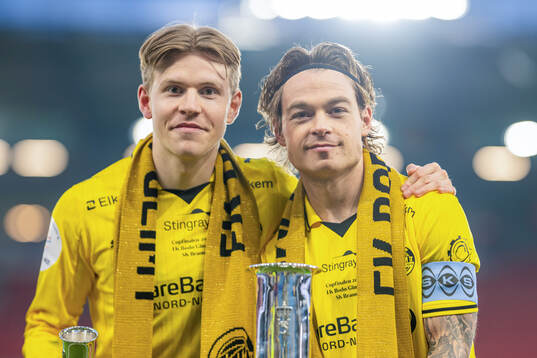 Jens Petter Hauge and Patrick Berg of Bodø/Glimt with the