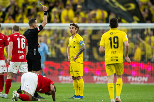 Patrick Berg of Bodø/Glimt receive a yellow card
