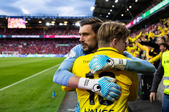 goalkeeper Nikita Haikin celebrates