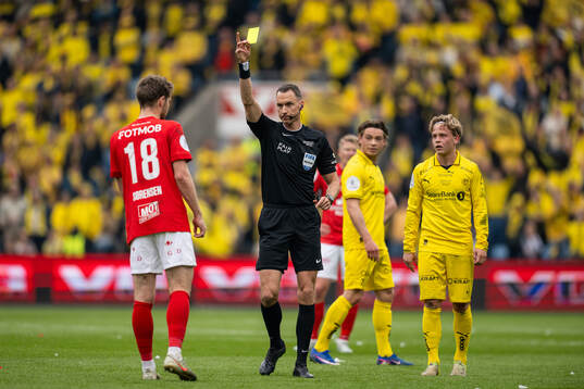 Jacob Lungi Sørensen of Brann receives a yellow card