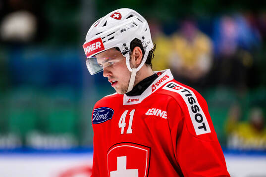Giancarlo Chanton of Switzerland looks dejected