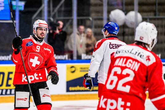 Damien Riat of Switzerland celebrates
