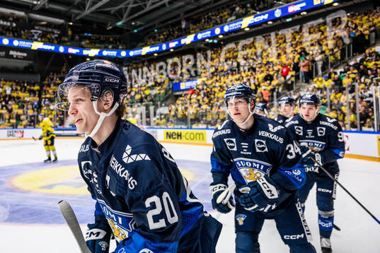 Patrik Puistola and Aatu Räty of Finland celebrates