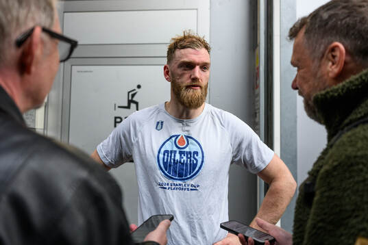 Mattias Ekholm of Sweden speaks to media