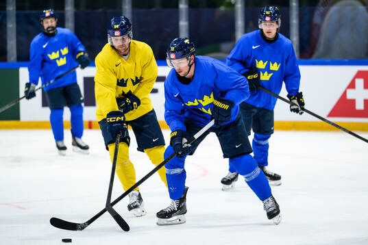 Joel Persson and Lucas Raymond of Sweden at a practice