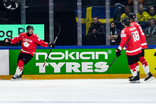John Tavares of Canada celebrates scoring 1-0