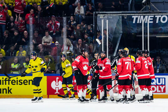 Players of Canada celebrate 2-0 by Ryan O'Reilly