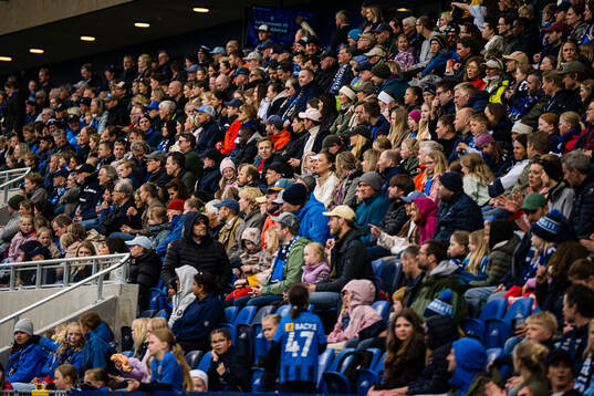 Spectators in the stands at Nye Nadderud Stadion