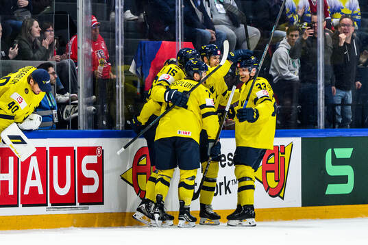 Jacob Larsson of Sweden celebrates with teammates