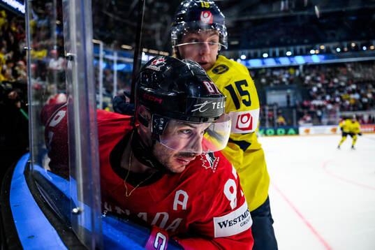 Sidney Crosby of Canada and Jack Berglund of Sweden