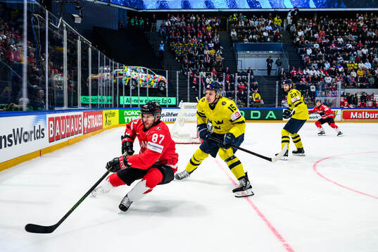 Sidney Crosby of Canada and Jack Berglund of Sweden