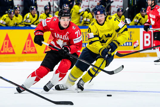 Macklin Celebrini of Canada and Oscar Sundqvist of Sweden