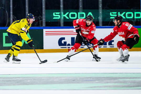 Lucas Raymond of Sweden and Macklin Celebrini and Dylan