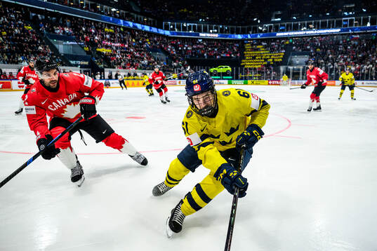 Dylan Demelo of Canada  and Viggo Björck of Sweden
