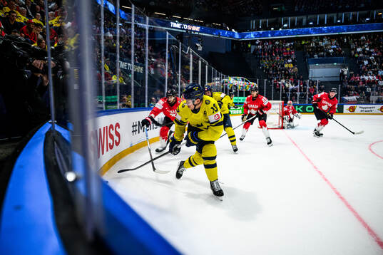 Darnell Nurse of Canada and Lucas Raymond of Sweden