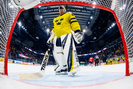 goaltender Magnus Hellberg of Sweden looks dejected