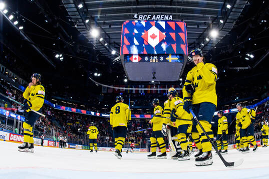 Oscar Sundqvist and Albert Johansson of Sweden look dejected