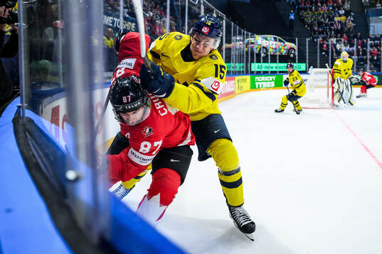 Sidney Crosby of Canada and Jack Berglund of Sweden