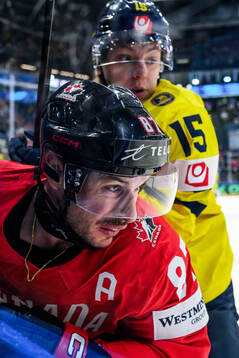 Sidney Crosby of Canada and Jack Berglund of Sweden