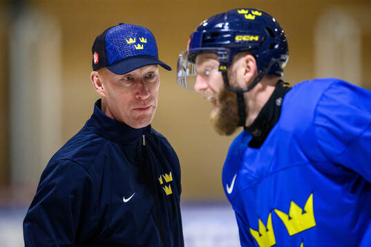 Assistant coach Jörgen Jönsson and Mattias Ekholm of