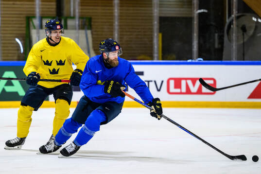 Jakob Silfverberg and Mattias Ekholm of Sweden at a