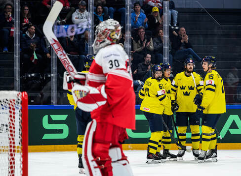 Viggo Björck of Sweden celebrates with Ivar Stenberg and