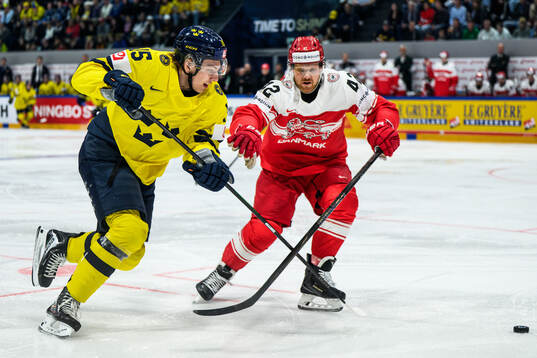 Jack Berglund of Sweden and Phillip Bruggisser of Denmark