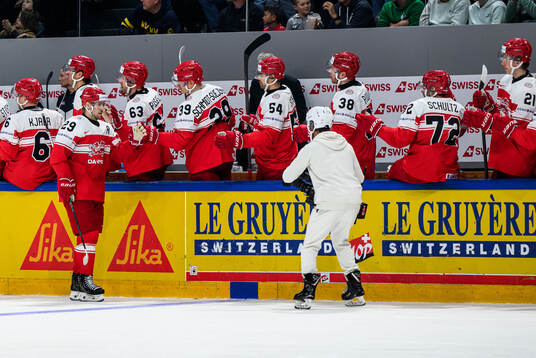 Mikkel Aagaard of Denmark celebrates with team mates
