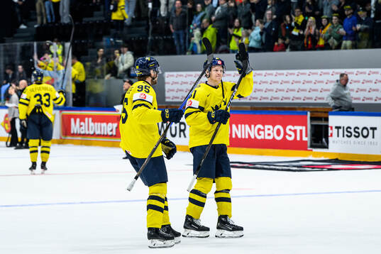 Jacob De La Rose and Emil Heineman of Sweden celebrate