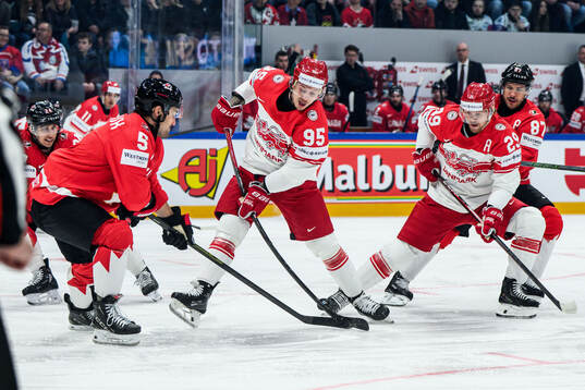 Denton Mateychuk of Canada and Nick Olesen of Denmark