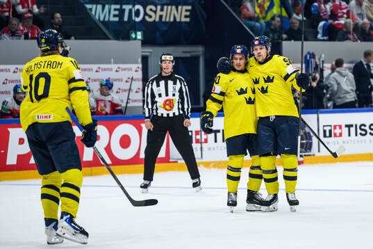 Joel Persson and André Petersson of Sweden celebrate the