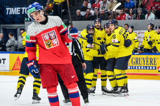 Oliver Ekman-Larsson of Sweden celebrate with team mates