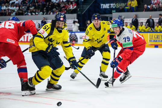 Viggo Björck and Lucas Raymond of Sweden against Tomas