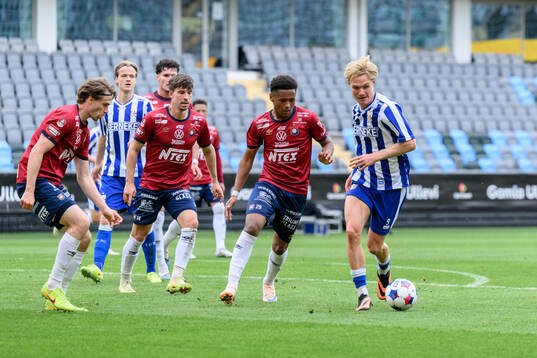 Örgrytes Marlon Ebietomere och IFK Göteborgs Max Fenger