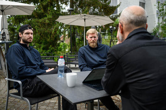 Oliver Ekman-Larsson and goaltender Magnus Hellberg of
