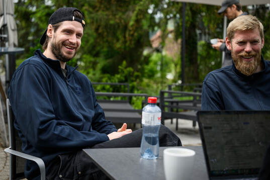 Oliver Ekman-Larsson and goaltender Magnus Hellberg of