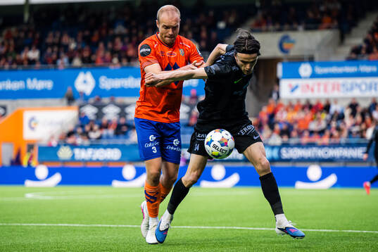 Olafur Gudmundsson of Aalesund and Ulrik Mathisen of Brann
