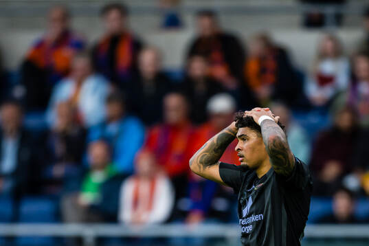 Noah Jean Holm of Brann looks dejected