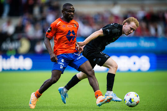 Uba Charles of Aalesund and Markus Haaland of Brann