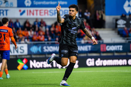 Noah Jean Holm of Brann celebrates