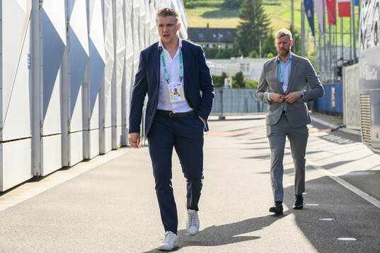 Jakob Silfverberg and goaltender Magnus Hellberg of Sweden
