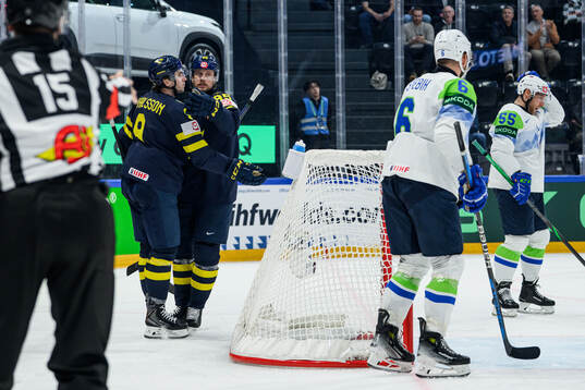Jacob De La Rose and Linus Karlsson of Sweden celebrating