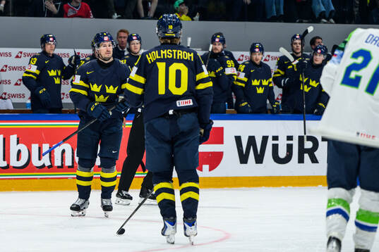Robert Hägg and Simon Holmström of Sweden celebrating the